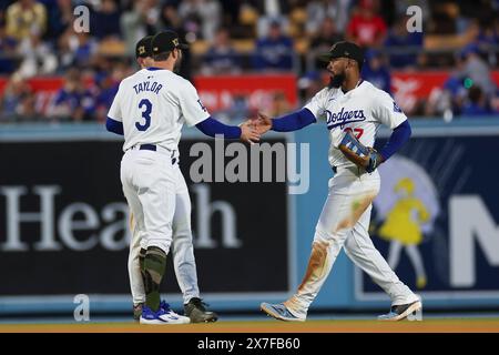 Los Angeles Dodgers' Teoscar Hernández gestures after an RBI double as ...