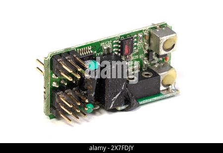 Small computer processing unit system on micro chip printed circuit board(PCB) at finger size, isolated Stock Photo
