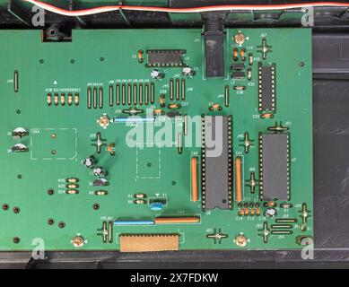 Small computer processing unit system on micro chip printed circuit board(PCB) at finger size, isolated Stock Photo