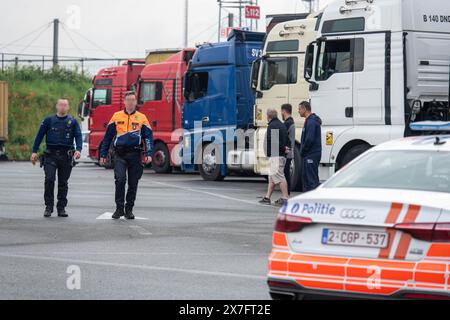 Antwerp, Belgium. 20th May, 2024. Police activity is seen while the Antwerp Police Zone, the Federal Police, the Social Intelligence and Investigation Service SIOD and the European Labor Authority ELA are organizing a large-scale heavy transport inspection action under the leadership of the labor auditor, with a focus on the employment conditions of truck drivers, in Antwerp, Monday 20 May 2024. BELGA PHOTO JONAS ROOSENS Credit: Belga News Agency/Alamy Live News Stock Photo