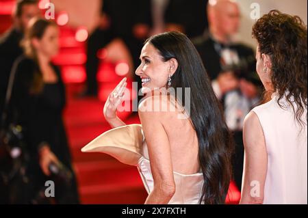 Cannes, France. 19th May, 2024. Demi Moore is attending the ''The Substance'' Red Carpet at the 77th annual Cannes Film Festival at Palais des Festivals in Cannes, France, on May 19, 2024. (Photo by Stefanos Kyriazis/NurPhoto)0 Credit: NurPhoto SRL/Alamy Live News Stock Photo