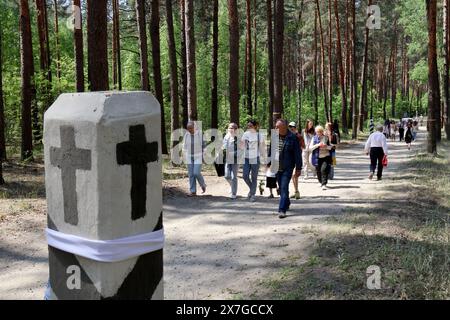 KYIV, UKRAINE - MAY 19, 2024 - Members of the public visit the Bykivnia Graves National Historical and Memorial Reserve on the Day of Remembrance of the Victims of Political Repressions, Kyiv, capital of Ukraine. Stock Photo