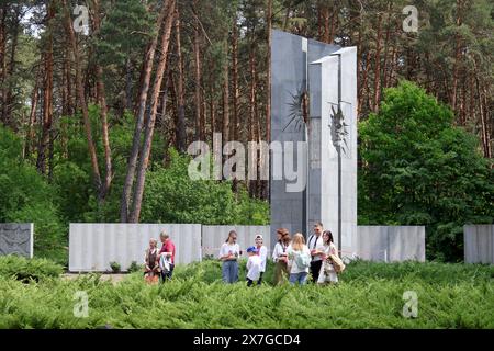 KYIV, UKRAINE - MAY 19, 2024 - Members of the public visit the Bykivnia Graves National Historical and Memorial Reserve on the Day of Remembrance of the Victims of Political Repressions, Kyiv, capital of Ukraine. Stock Photo