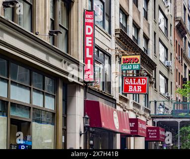 facades of buidling and ground floor businesses on east 35th street, nyc Stock Photo