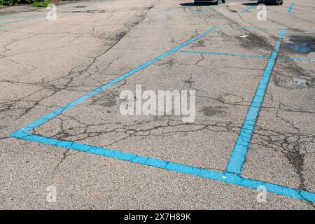 Paid parking lots are indicated with blue lines. neighborhoods with parking on the blue lines is regulated by the municipality, the road signs indicat Stock Photo