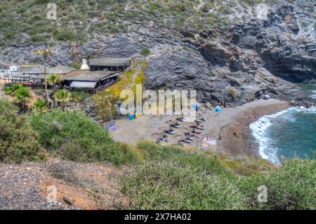 HDR image of the Beach and La Cala restaurant at Cala del Barco in La Manga Golf Resort Murcia Spain Stock Photo