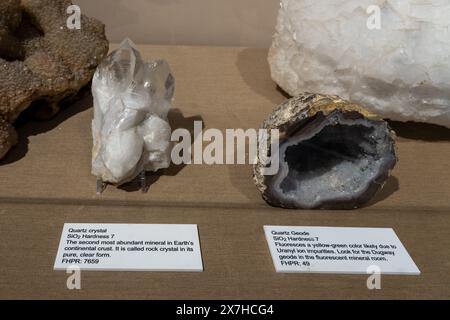 Quartz crystals and a quartz geode,  minerals in the Utah Field House of Natural History Museum. Vernal, Utah. Stock Photo