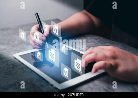 Woman use digital tablet for online document management system. DMS concept. FTP (File Transfer Protocol). Cloud computing technology. Stock Photo