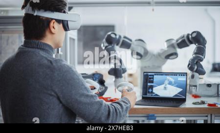 Computer Science Specialist in Virtual Reality Headset Holding Controllers and Moving Bionic Claw. Man Developing Program for Motion of Robotic Arm. Innovative Automated Technologies Concept. Stock Photo