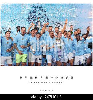 Beijing, China. 20th May, 2024. Players of Manchester City celebrate with the Premier League trophy after the English Premier League football match between Manchester City and West Ham United in Manchester, Britain, May 19, 2024. Credit: Xinhua/Alamy Live News Stock Photo