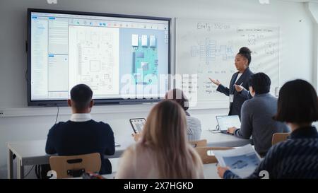 Asian female teacher and diverse students having video call on laptop ...