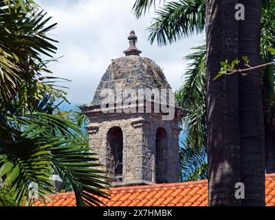 Miami, Florida, United States - April 6, 2024: Bell tower of the Plymouth Congregational Church in Coconut Grove. Built in 1917. Only editorial use. Stock Photo