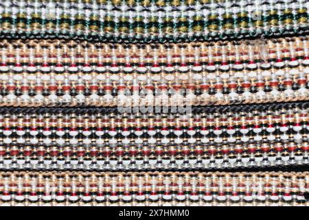 woven multi-colored threads create a colorful, bright image of the braid Stock Photo