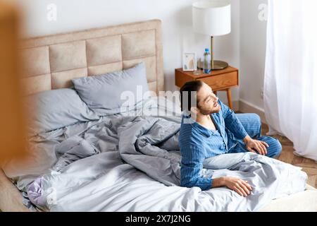 A handsome man smiling peacefully. Stock Photo