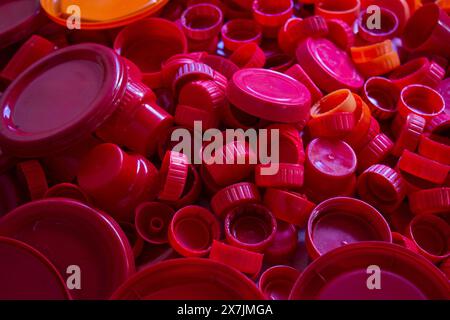 Goiania, Goias, Brazil – April 29, 2024: A pile of red plastic caps separated for recycling. Stock Photo