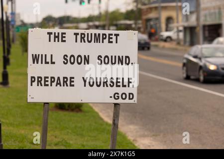 Rayville, Louisiana, USA - April 24, 2024: Cloudy afternoon light shines on a sign signaling preparation for the rapture. Stock Photo