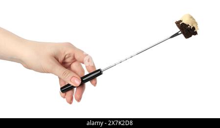 Tasty fondue. Woman holding fork with piece of bread and melted cheese on white background, closeup Stock Photo