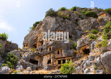 View of the ancient Lycian rock tombs in the city of Myra Stock Photo