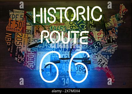 Neon sign with inscription Historic Route 66 in front of USA map Stock Photo