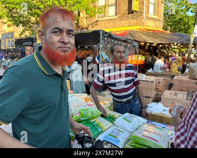 Two men with henna colored beards and hair at Bangladeshi street fair in the Kensingto section of Brooklyn, New York Stock Photo