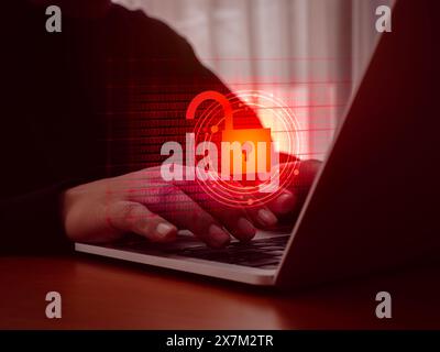 Cyberattack and internet crime, scam, hacking and malware concepts. Unlocked padlock icon on red digital binary code data numbers on dark virtual scre Stock Photo