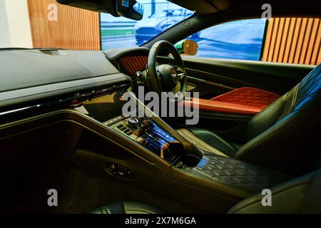 Bangkok ,Thailand ,May -15, 2024 : Interior of Aston Martin DB12 is made of high quality materials. Air conditioning vents and modern front console pa Stock Photo