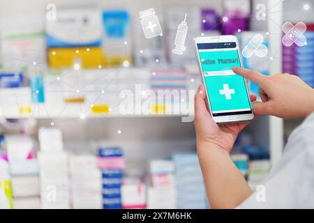 Pharmacist using mobile smart phone for search bar on display in pharmacy drugstore shelves background.Online medical concept. Stock Photo