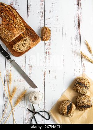 Fresh Selection of Breads on Whitewash Wooden Table Stock Photo