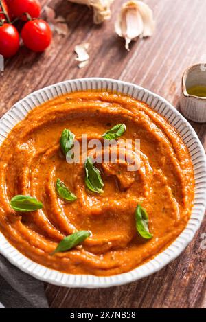 Dish of fresh tomato sauce with basil, cherry tomatoes and garlic Stock Photo