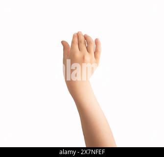 Close-up of child hand holding some like a blank object isolated on a white background Stock Photo