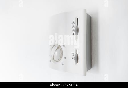 Control panel for built-in air conditioners on the wall. Stock Photo