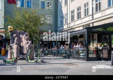 Skvallertorget or Gossip square with a sculpture by Pye Engström in Norrköping during spring in Sweden.  Norrköping is a historic industrial town. Stock Photo