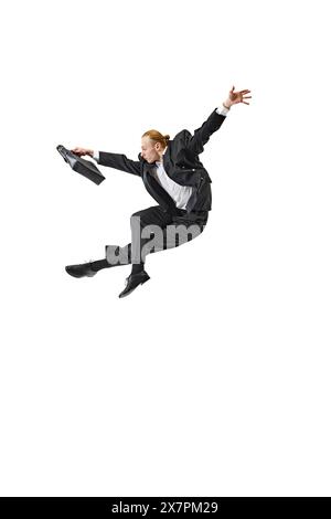 Business professional in suit performing dynamic leap. Swift and decisive movements required for success in corporate world. Stock Photo