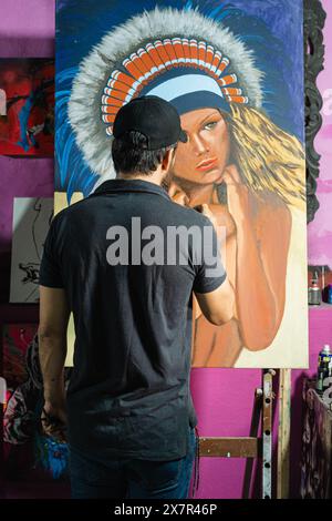 Back view portrait of artist painting at art studio Stock Photo - Alamy