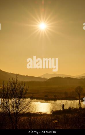 Golden Sunset on Costa Lake in Autumn season, Euganean Hills Regional Park, province of Padua, Italy Stock Photo