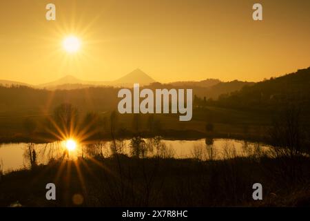 Golden Sunset on Costa Lake in Autumn season, Euganean Hills Regional Park, province of Padua, Italy Stock Photo