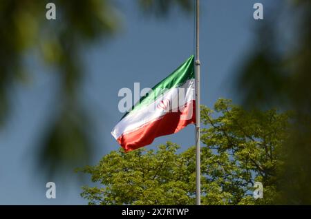 May 21, 2024, Peshawar, Peshawar, Pakistan: The Iranian national flag flies at half-mast at the Khana-e-Farhang Iranian culture centre, following the deaths of Iran's president Raisi and Foreign Minister Amir-Abdollahian, in Peshawar, Pakistan, 21 May 2024. Iranian president Raisi and seven others, among them foreign minister Amir-Abdollahian, were killed in a helicopter crash on 19 May 2024, after an official visit in Iran's northwest near the border with Azerbaijan, the Iranian government confirmed. The Pakistani government announced a day of national mourning for 21 May 2024, to express 'fr Stock Photo