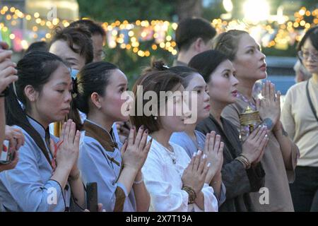 Singapore. 21st May, 2024. Buddhists pray on the eve of Vesak Day at Kong Meng San Phor Kark See Monastery in Singapore, May 21, 2024. Credit: Then Chih Wey/Xinhua/Alamy Live News Stock Photo