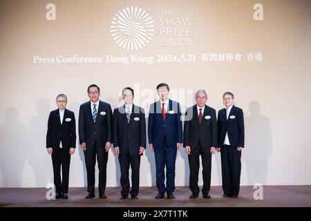 Hong Kong, China. 21st May, 2024. Guests pose for photos after a press conference announcing this year's Shaw laureates in Hong Kong, south China, May 21, 2024. Four scientists won the Shaw Prize this year for their outstanding work in the prize's three categories, the Shaw Prize Foundation announced on Tuesday. TO GO WITH '4 scientists worldwide win Shaw Prize in 2024' Credit: Zhu Wei/Xinhua/Alamy Live News Stock Photo