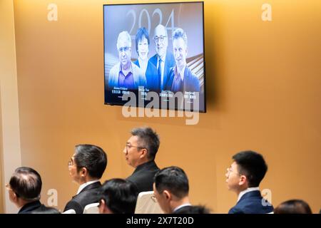 Hong Kong, China. 21st May, 2024. Photos of this year's Shaw laureates are displayed on a screen at a press conference in Hong Kong, south China, May 21, 2024. Four scientists won the Shaw Prize this year for their outstanding work in the prize's three categories, the Shaw Prize Foundation announced on Tuesday. TO GO WITH '4 scientists worldwide win Shaw Prize in 2024' Credit: Zhu Wei/Xinhua/Alamy Live News Stock Photo