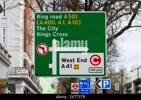 London, UK - March 23, 2024; London trunk road intersection sign for West End congestion charge zone Stock Photo