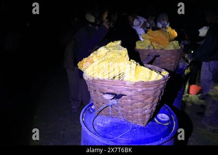 Sulfur carriers basket at Kawah Ijen, Java in Indonesia Stock Photo