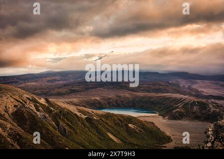 Viewpoint of sunset over Tama Lakes with Mount Ruapehu hiding in the cloud at Tongariro national park, North island of New Zealand Stock Photo
