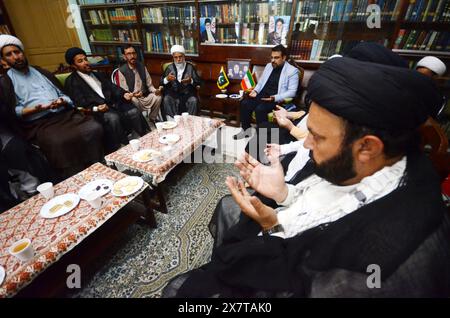 May 21, 2024, Peshawar, Peshawar, Pakistan: Reactions in Pakistan after Iranian President Raisi's death in helicopter crash.PESHAWAR, PAKISTAN, MAY, 21: Dr. Hussain Chakami Director of the Republic of Iran Peshawar People pray at the mourning Iranian Cultural Center after the death of Iran's President Raisi and Foreign Minister Amir Abdullahian on May 20, 2024 in Peshawar, Pakistan. Iran's President Ebrahim Raisi, Foreign Minister Hossein Amir-Abdollahian and several others were killed in a helicopter crash on 19 May 2024, after an official visit in Iran's northwest near the border with Azer Stock Photo