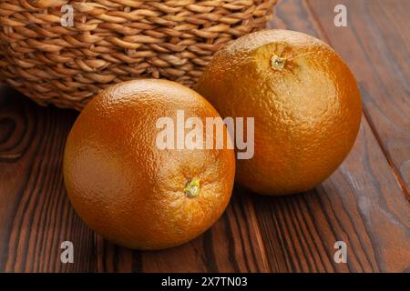 chocolate oranges on wood background Stock Photo