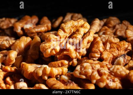 walnuts macro on black background Stock Photo
