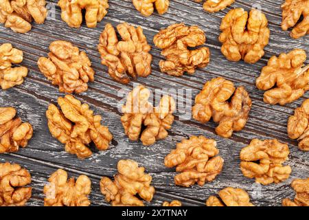 walnuts pattern on wood background top view Stock Photo