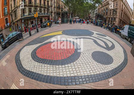 Barcelona, Catalonia, Spain - April 15, 2024:Mosaic by Joan Miro located in La Rambla, Ciutat Vella. It is designed by the Catalan artist to welcome t Stock Photo