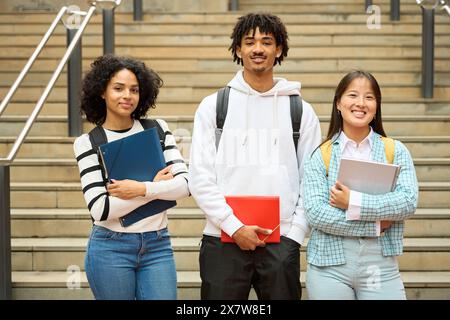 Three multiethnic students at the University Stock Photo