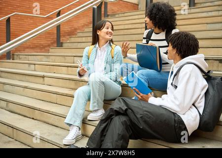 three young multiethnic students having fun Stock Photo